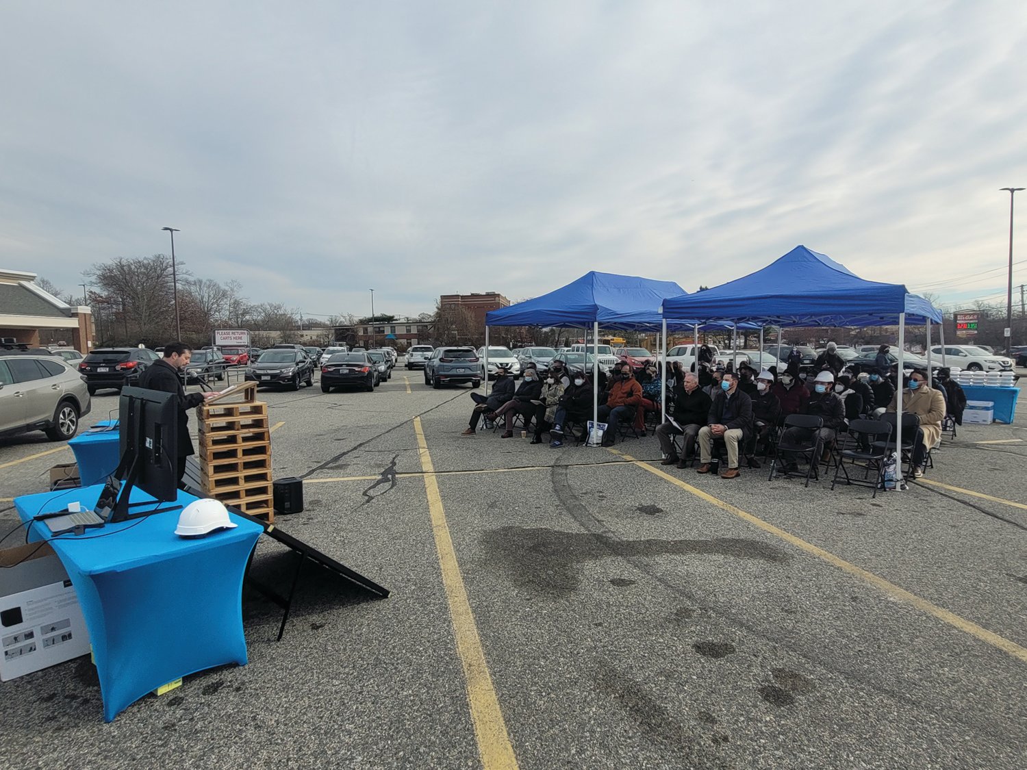 Ecogy Energy CEO Jack Bertuzzi addressed the crowd gathered in the parking lot of Johnston’s Ocean State Job Lot store on Hartford Avenue. His company will operate the newly installed solar field on the store’s roof.